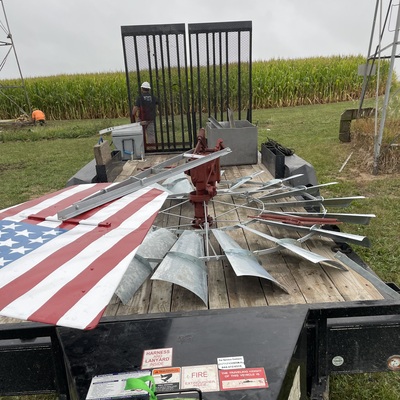 Aermotor windmill head painted by Patty Ingrahm ready to be install on 80ft tower