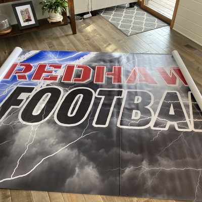 Tear-away banner for football