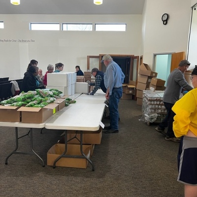 Commodities - Bagging items to distribute in the church sanctuary.