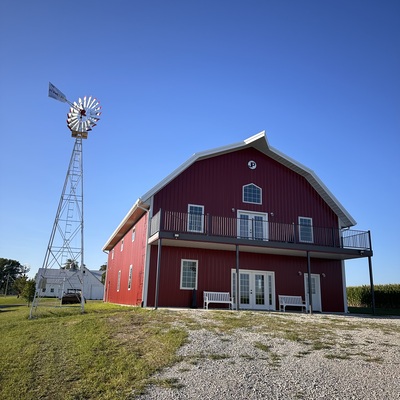 Aermotor windmill with fresh paint and relocated to the west side of the Bruning Barn