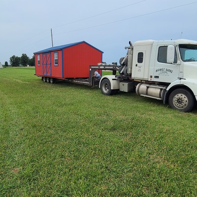 Delivering storage building