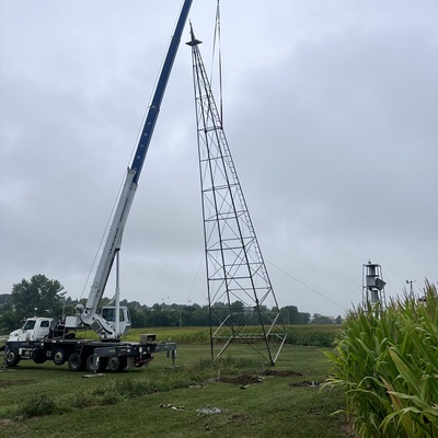 Relocating the 80ft windmill tower to the South end by Hwy 36