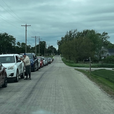 People lined up on street for fresh mobile.