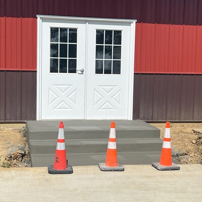 Steps into the fellowship hall.