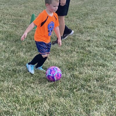 Beau Schuetz practicing his soccer skills at Bruning fields.