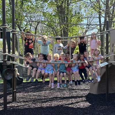 2025-2026’s 3 and 4 year old class on the playground!